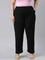 Women Solid Black Mid Rise Casual Rib Pants