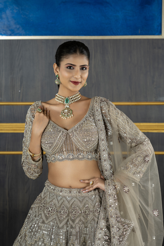 Net lehenga with Heavy Jarkan on Lehenga and Blouse with Heavy 4 Sided Duppata and Full Hands