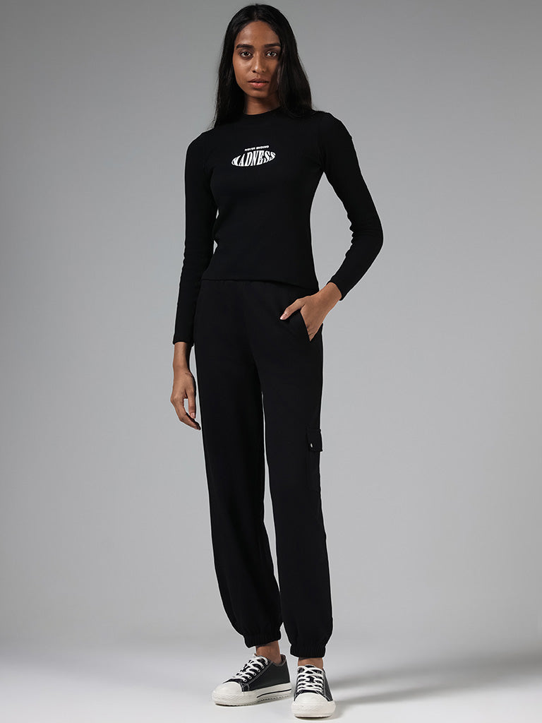 Buy Studiofit Solid Black Wide Leg Track Pants from Westside