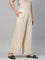 Women Solid Light Beige Woven Viscose Mid Rise Basic Palazzos