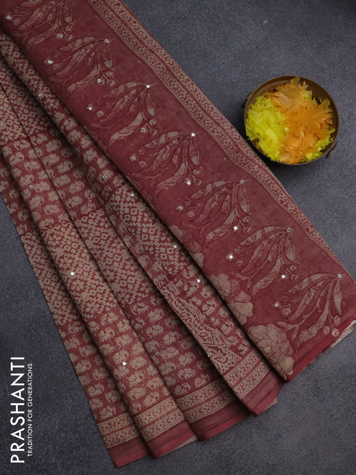 Chanderi silk cotton saree pastel maroon and beige with allover prints & mirror work and printed border