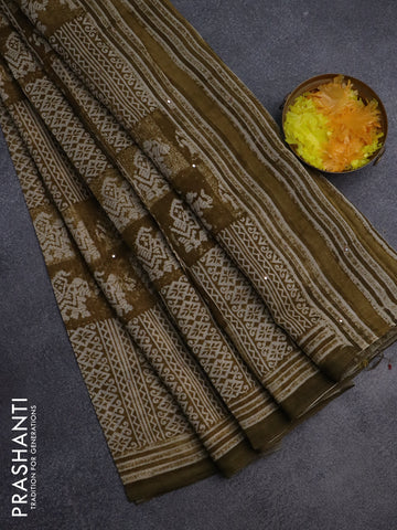 Chanderi silk cotton saree mehendi green and beige with allover prints & mirror work and printed border