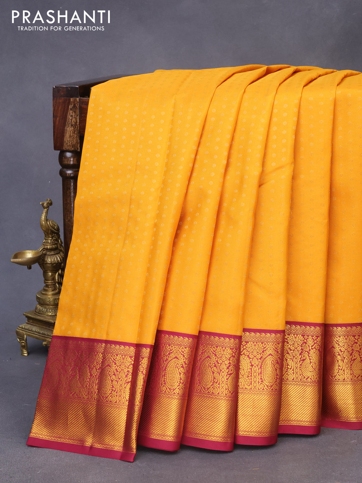 Pure kanchipuram silk saree mustard yellow and dark pink with allover zari woven butta weaves and zari woven korvai border