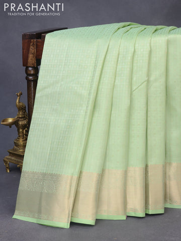 Pure kanchipuram silk saree pista green with allover self emboss & zari buttas and zari woven border