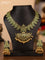 Antique necklace manga pattern with green kemp stones and golden beads hanging