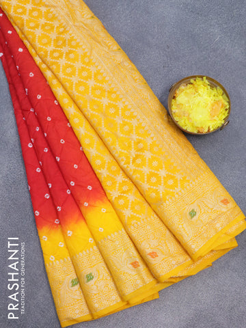 Bandhani saree red and mango yellow with allover bandhani prints and banarasi style border