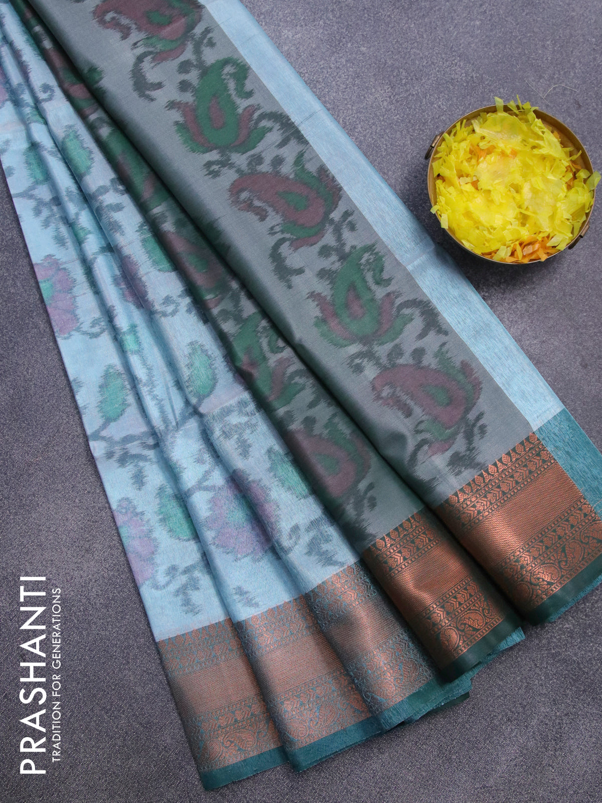 Banarasi semi tussar saree light blue shade and green with allover ikat weaves and copper zari woven border