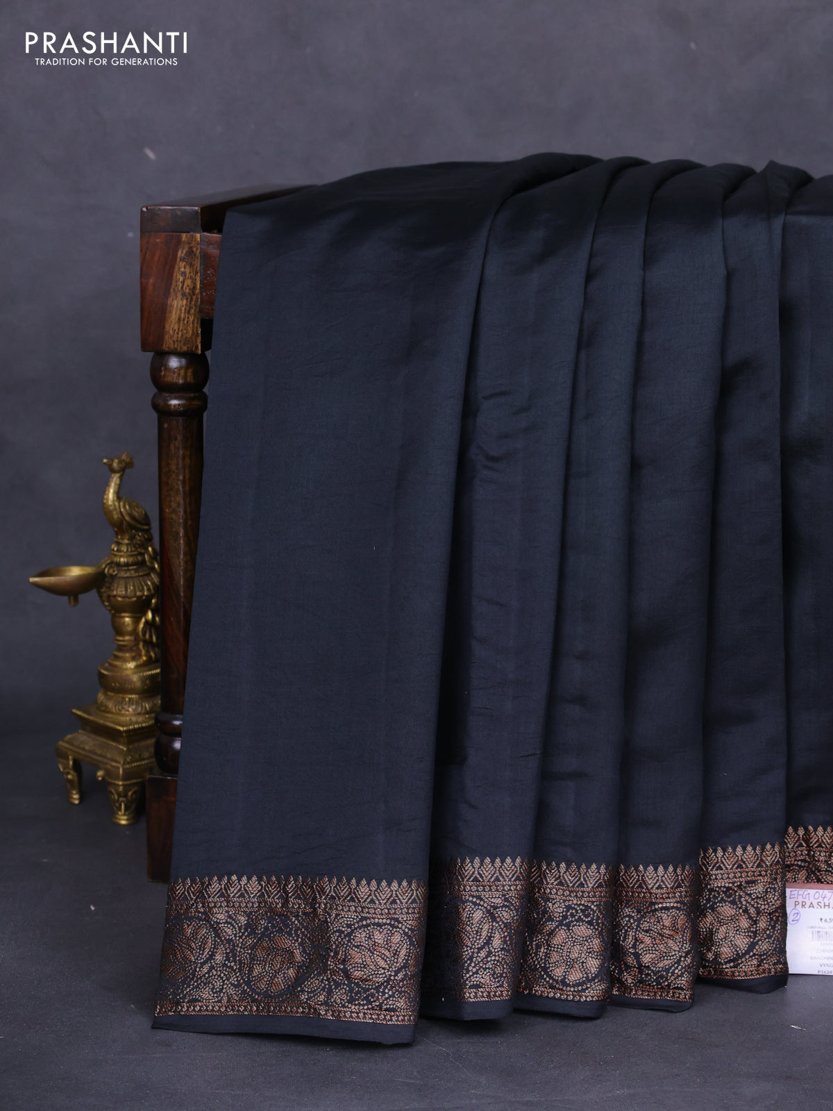 Chiniya silk saree black with plain body and woven border