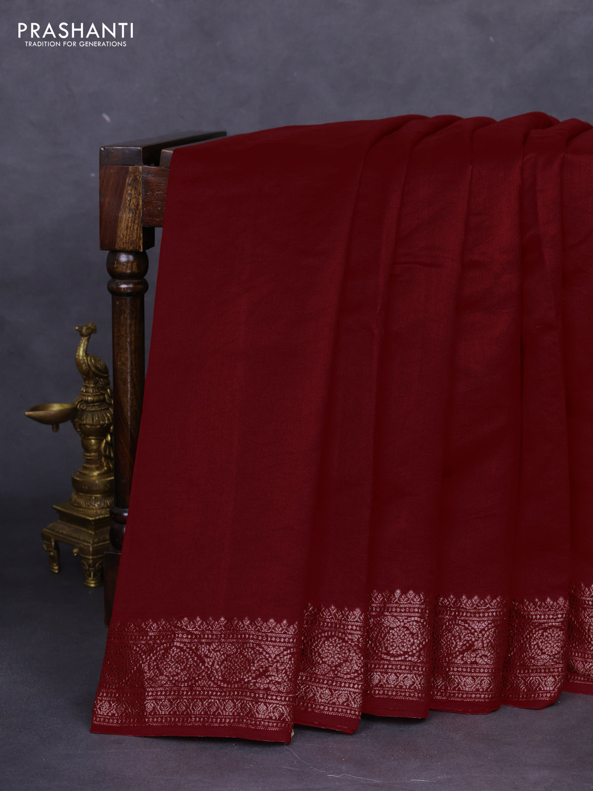 Chiniya silk saree maroon with plain body and woven border