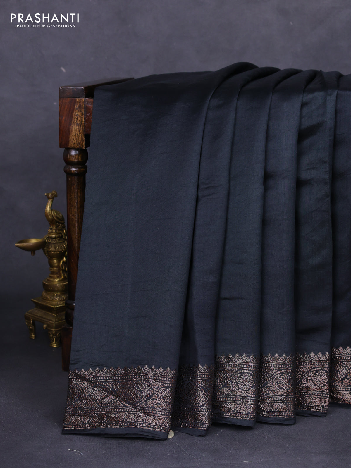 Chiniya silk saree black with plain body and woven border