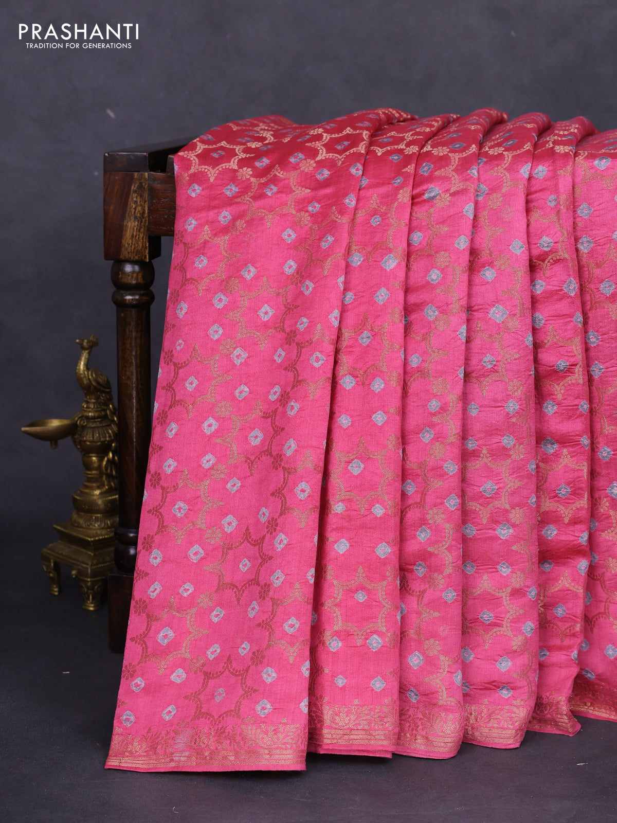 Chiniya silk saree peach pink and mehendi green with allover zari weaves & bandhini prints and zari woven border