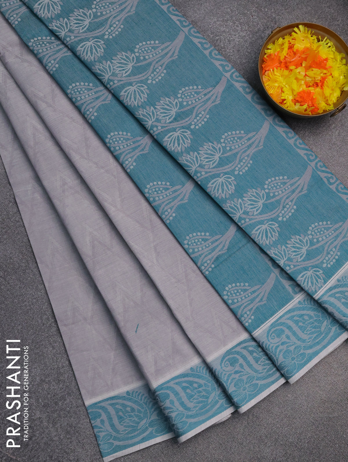 Coimbatore cotton saree grey and teal green with allover self emboss and thread woven border