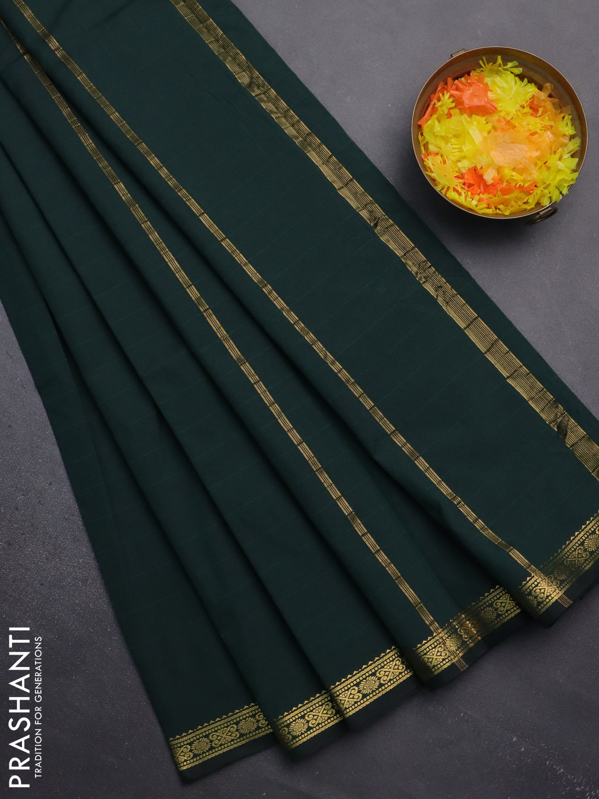 Arani semi silk saree bottle green with plain body and zari woven border