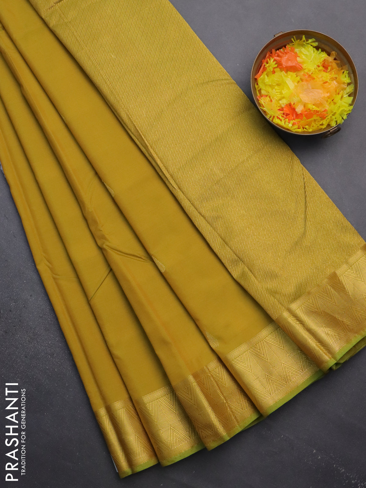 Arani semi silk saree dual shade of mustard yellow with zari woven thilak buttas and zari woven border