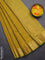 Arani semi silk saree dual shade of mustard yellow with zari woven thilak buttas and zari woven border