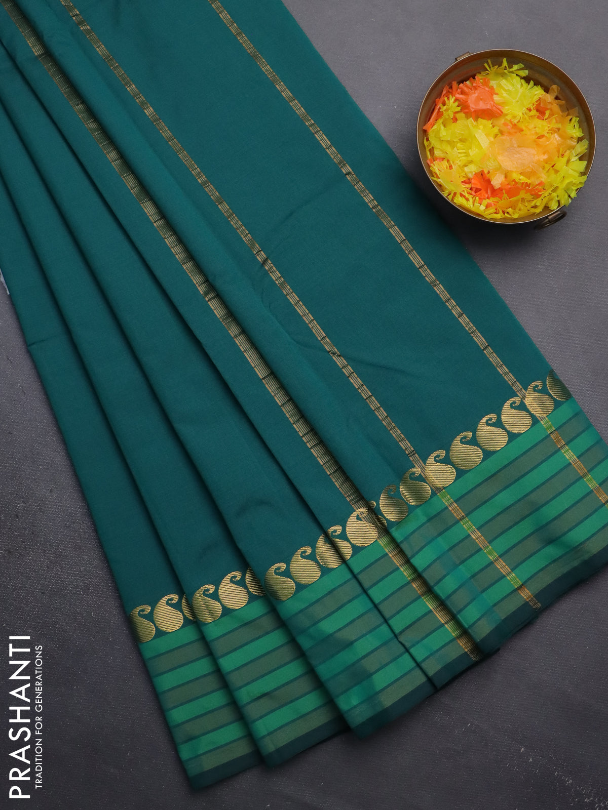 Arani semi silk saree peacock green and green with plain body and paisley zari woven simple border