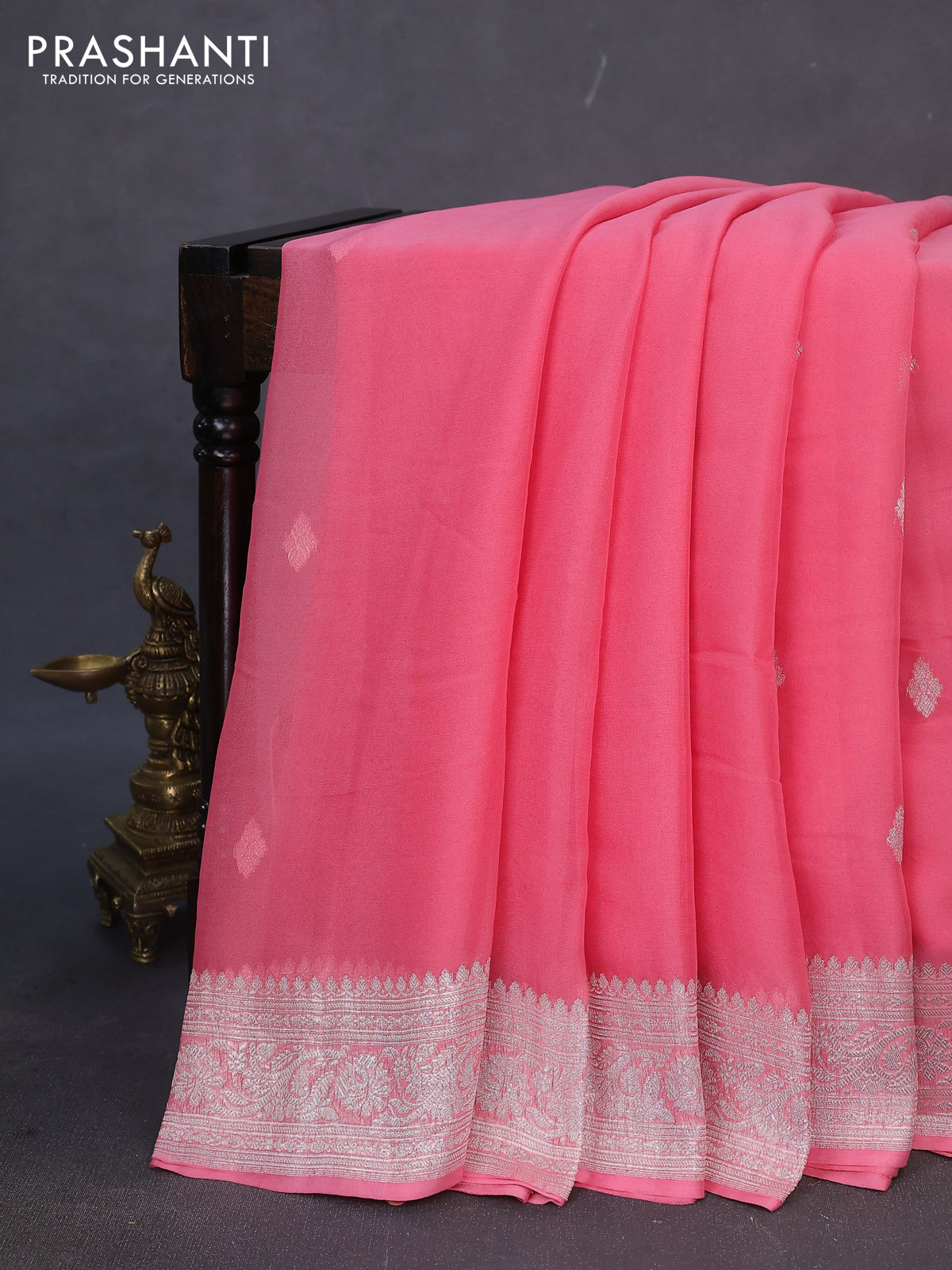 Banarasi chiffon silk saree peach pink with silver zari woven buttas and silver zari woven border