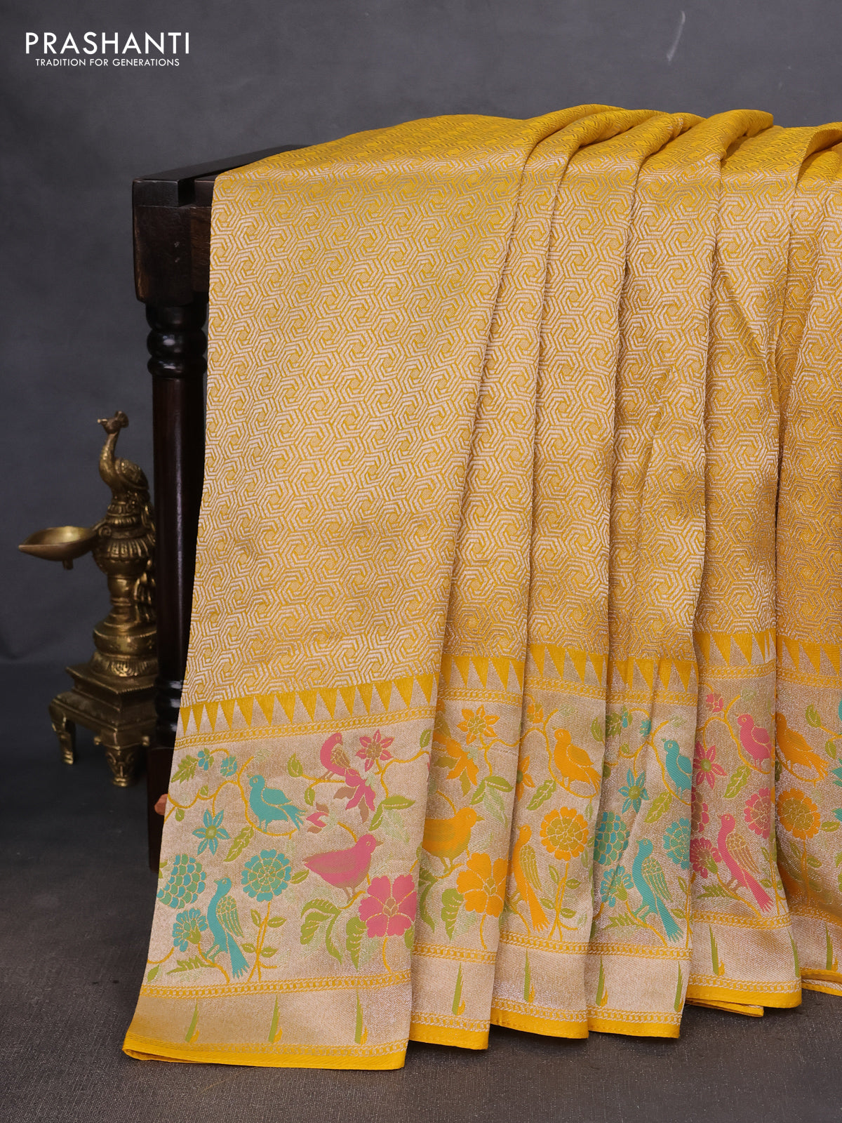 Banarasi semi raw silk saree yellow with allover silver woven brocade weaves and floral design paithani border
