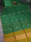Kora silk cotton saree green and mustard yellow with thread & zari woven leaf buttas and piping border