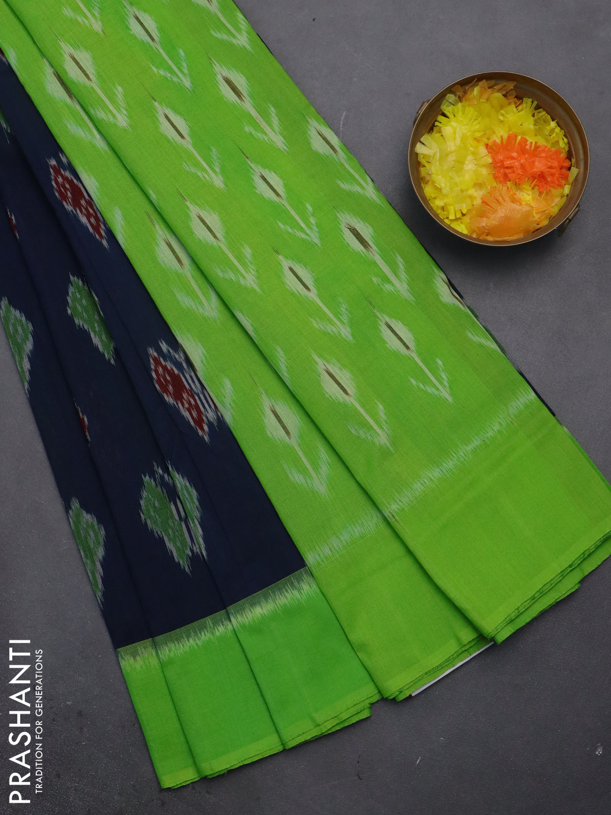 Ikat cotton saree peacock blue and light green with allover ikat butta weaves and simple border