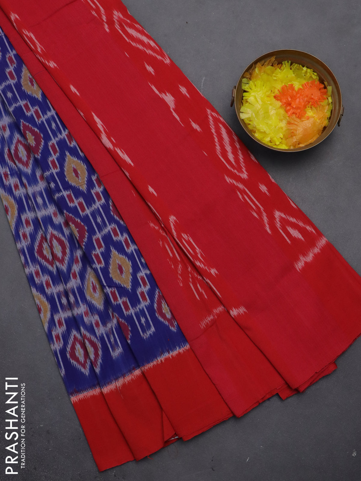 Ikat cotton saree blue and red with allover ikat weaves and simple border