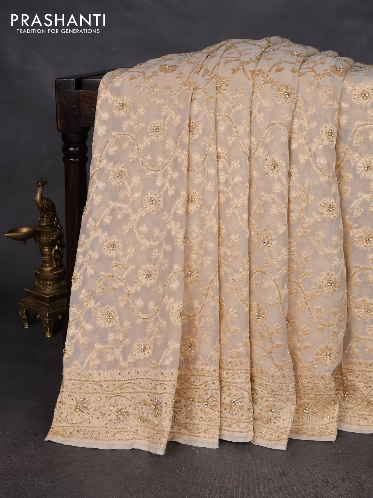 Banarasi georgette saree off white with allover jaal weaves & stone work and zardosi work border