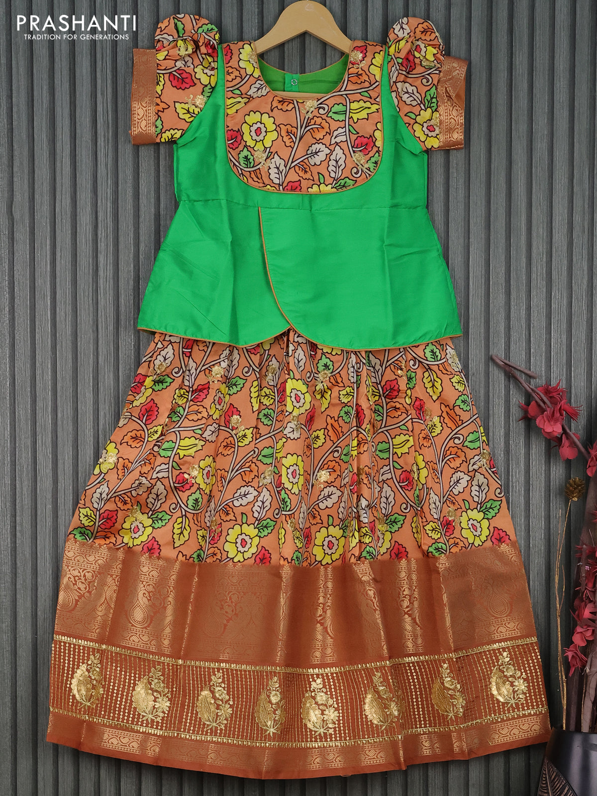 Banarasi kids lehenga green and pale orange shade with patch work neck pattern and kalamkari prints & long banarasi style sequin work border for 8 years