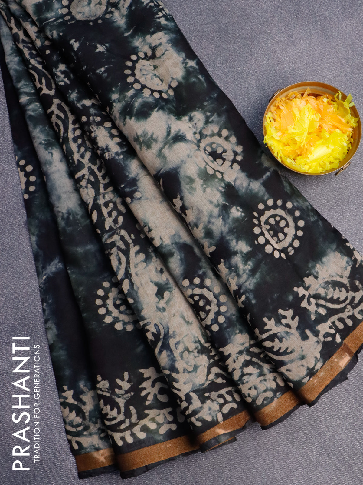 Muslin cotton saree black with batik butta prints and small zari woven border