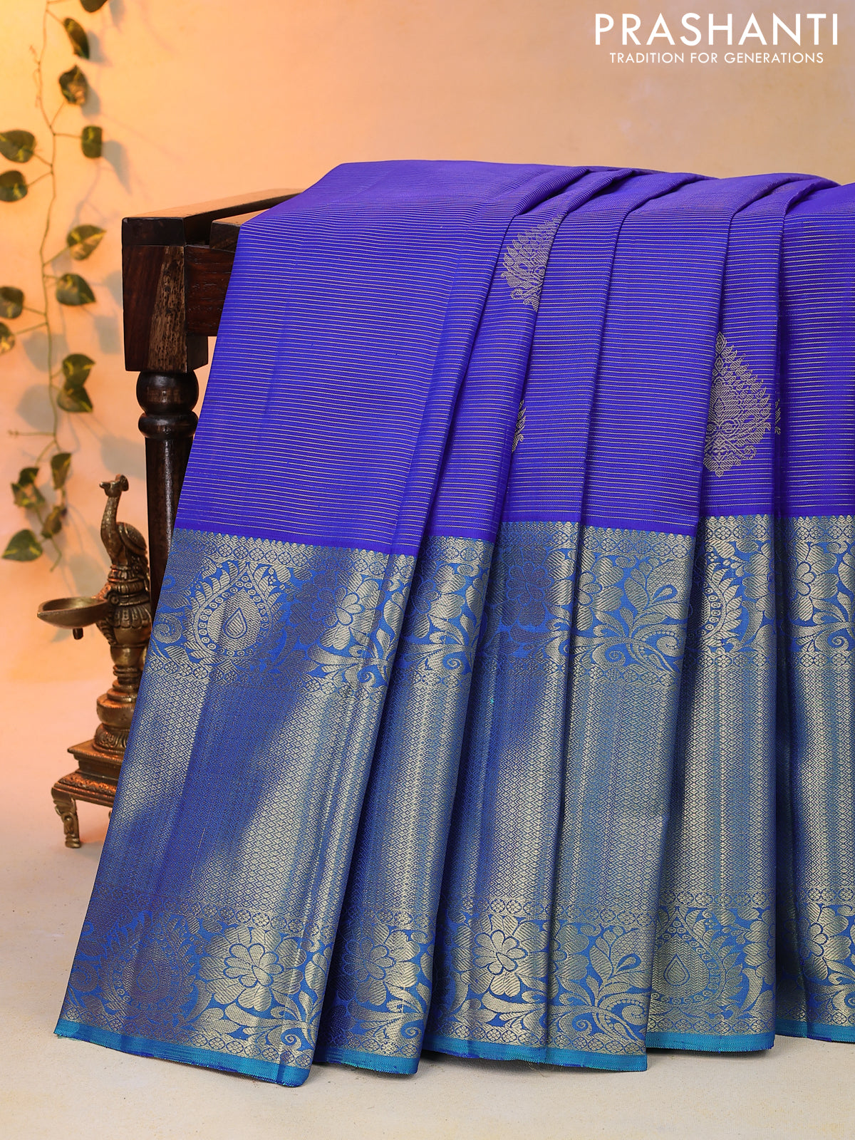 Pure kanjivaram silk saree blue and cs blue with allover zari woven stripes pattern and long zari woven border