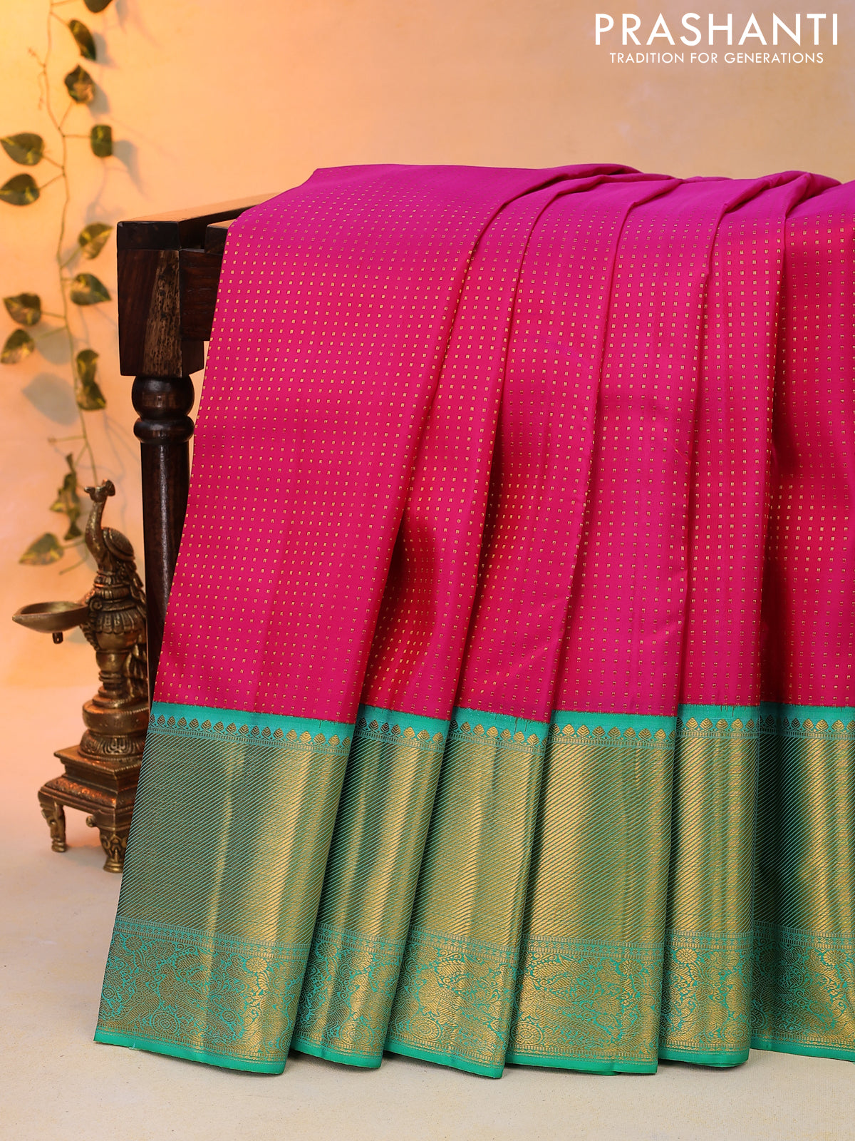 Pure kanjivaram silk saree pink and teal green with allover zari woven butta weaves and long zari woven korvai border