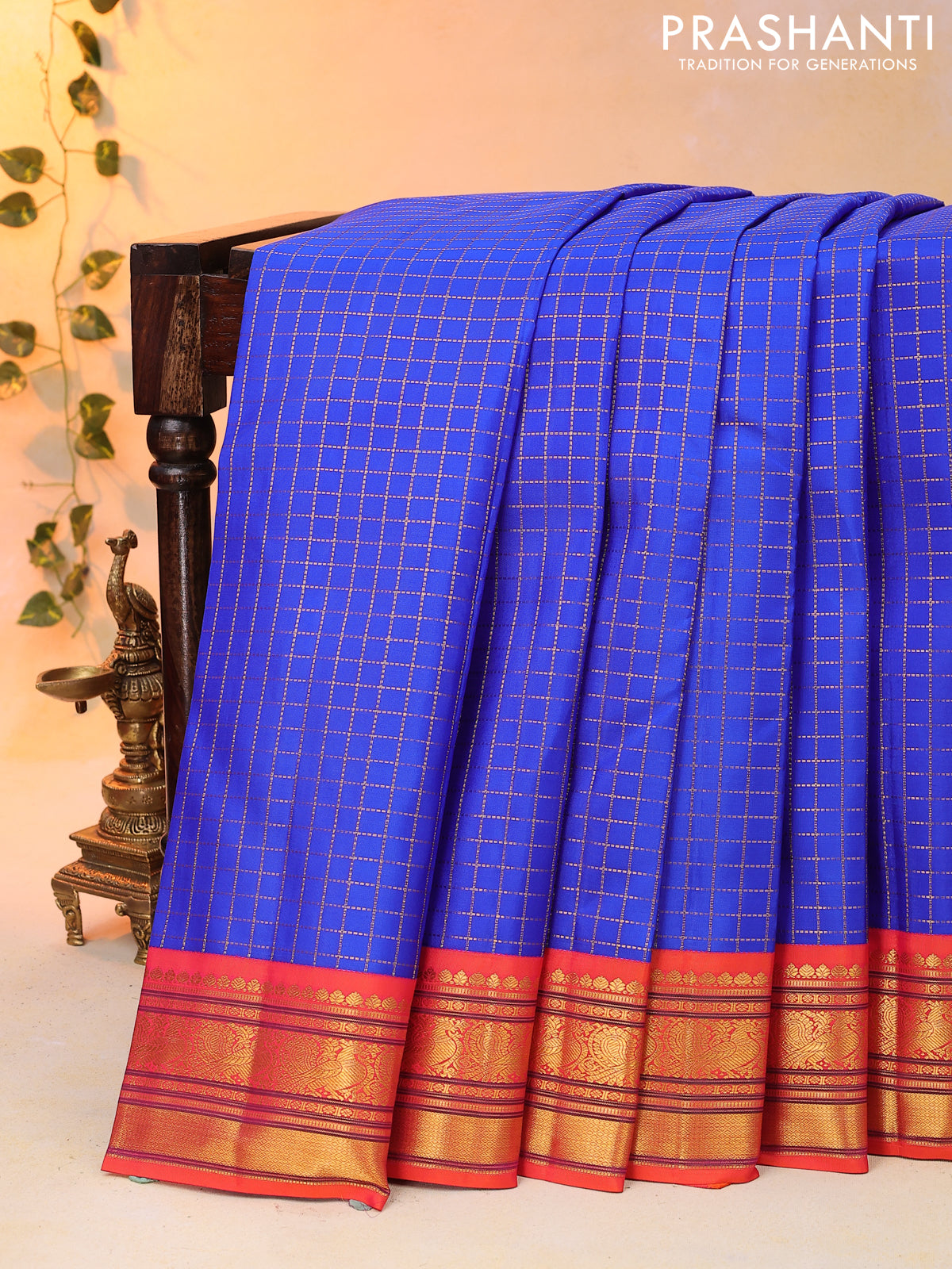 Pure kanjivaram silk saree blue and orange with allover zari checked pattern and annam zari woven border