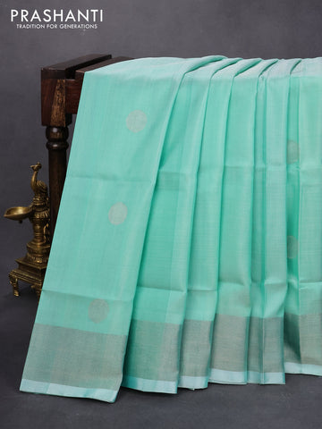 Pure uppada silk saree teal green shade with silver zari woven coin buttas and silver zari woven border