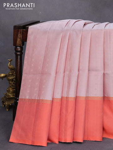 Pure soft silk saree pastel pink shade and orange with allover zari woven buttas and zari woven simple border