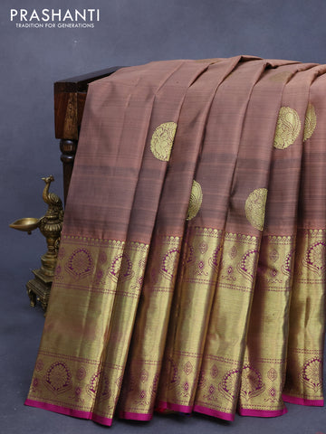 Pure kanjivaram silk saree pastel brown and purple with peacock zari woven buttas and long rich zari woven border