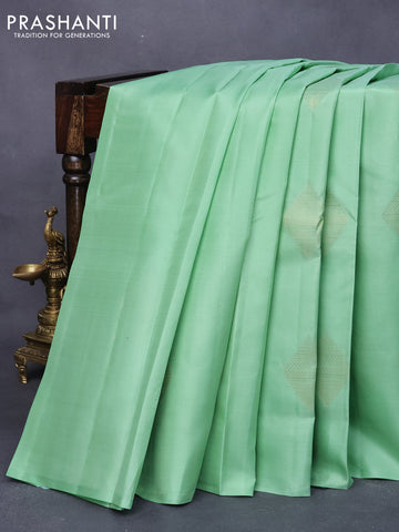 Pure kanjivaram silk saree pastel green and dark green with zari woven geometric buttas in borderless style