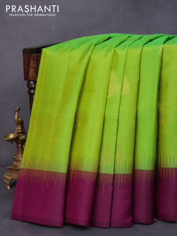 Pure kanjivaram silk saree light green and dark magenta pink with zari woven buttas and simple border