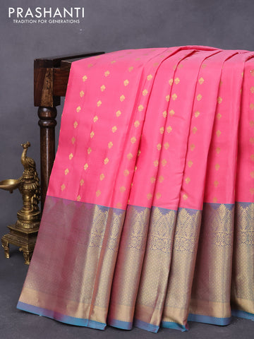 Pure kanjivaram silk saree pink and dual shade of teal blue with allover zari woven buttas and long zari woven border