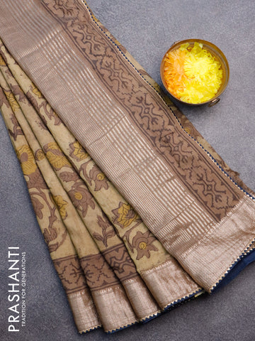 Chanderi silk cotton saree elaichi green and peacock blue with natural vegetable prints and zari woven gotapatti lace border