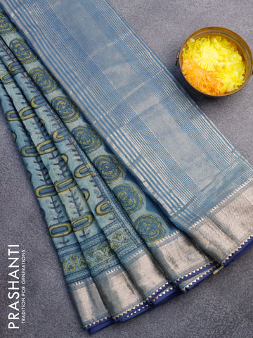 Chanderi silk cotton saree pastel blue and blue with natural vegetable prints and zari woven gotapatti lace border