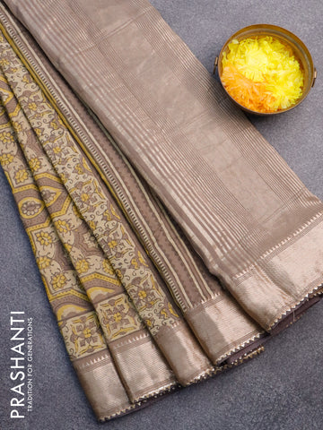 Chanderi silk cotton saree pastel brown shade and beige with allover vanaspati ajrakh prints and zari woven gotapatti lace border