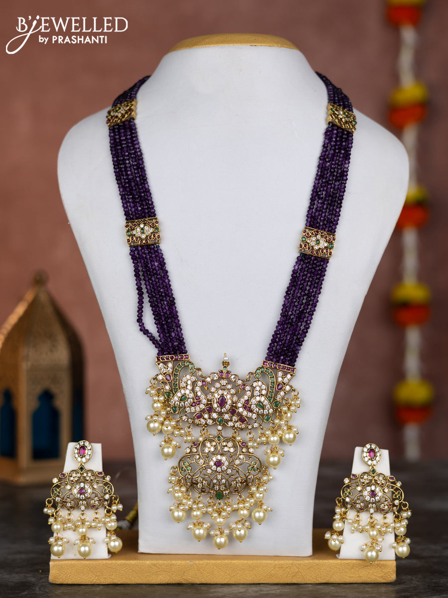 Beaded multilayer voilet necklace with zircon ,kemp & cz stones and pearl hangings