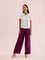 Women Medium Violet Solid Viscose Knit Mid Rise Palazzos