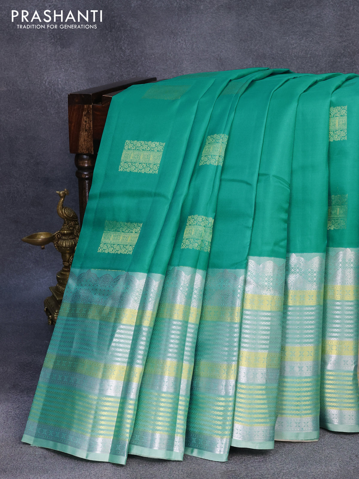 Pure kanjivaram silk saree teal blue and cream with zari woven box type buttas and long zari woven border