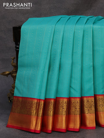 Pure kanjivaram silk saree light blue and pink with allover zari weaves and annam zari woven korvai border