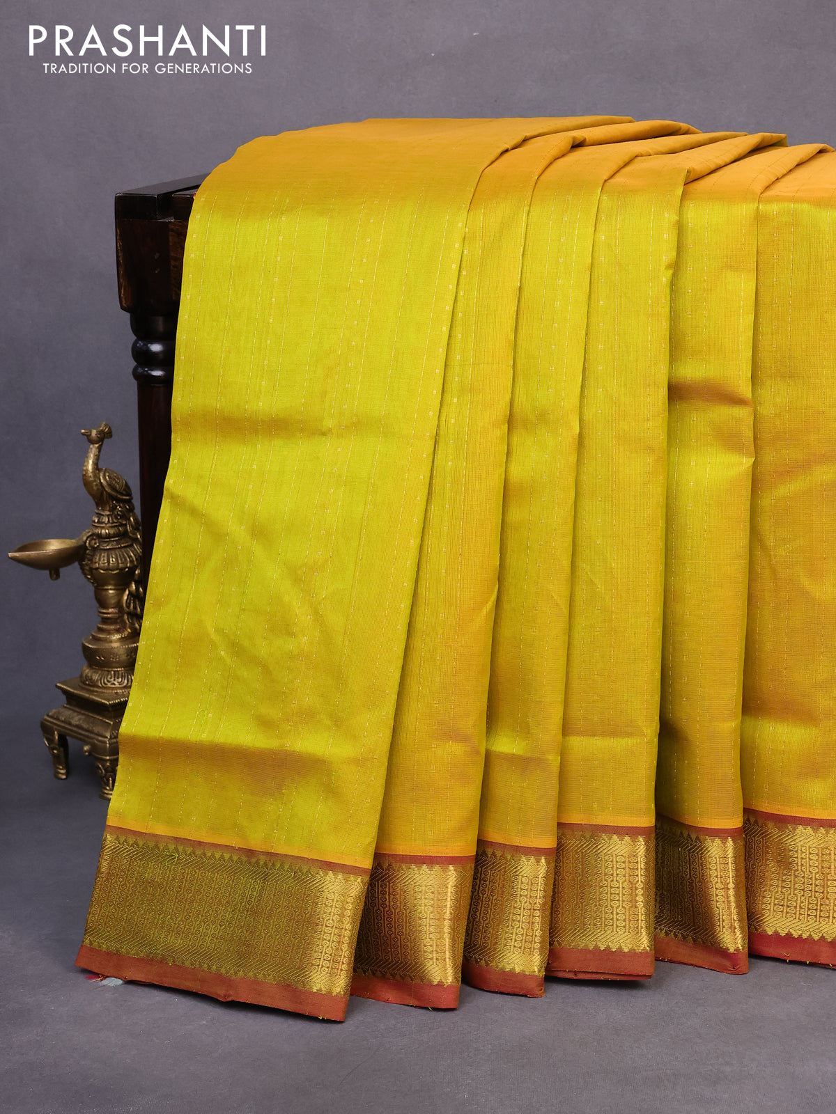 10 yards silk cotton saree yellowish green and maroon with allover zari weaves & buttas and zari woven border