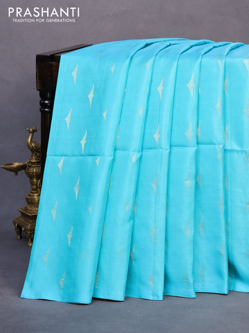 Pure soft silk saree light blue and green with allover zari woven buttas in borderless style - borderless style