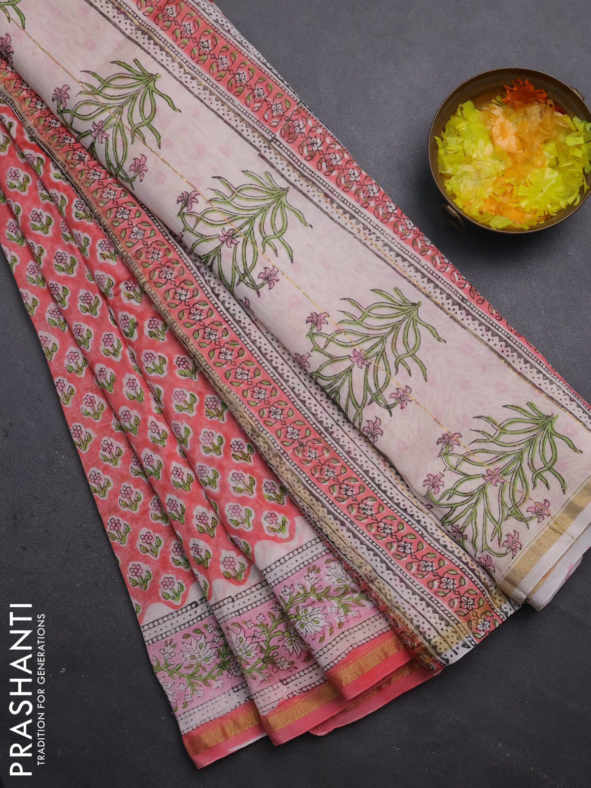 Chanderi bagru saree peach pink and off white with allover floral butta prints and small zari woven border