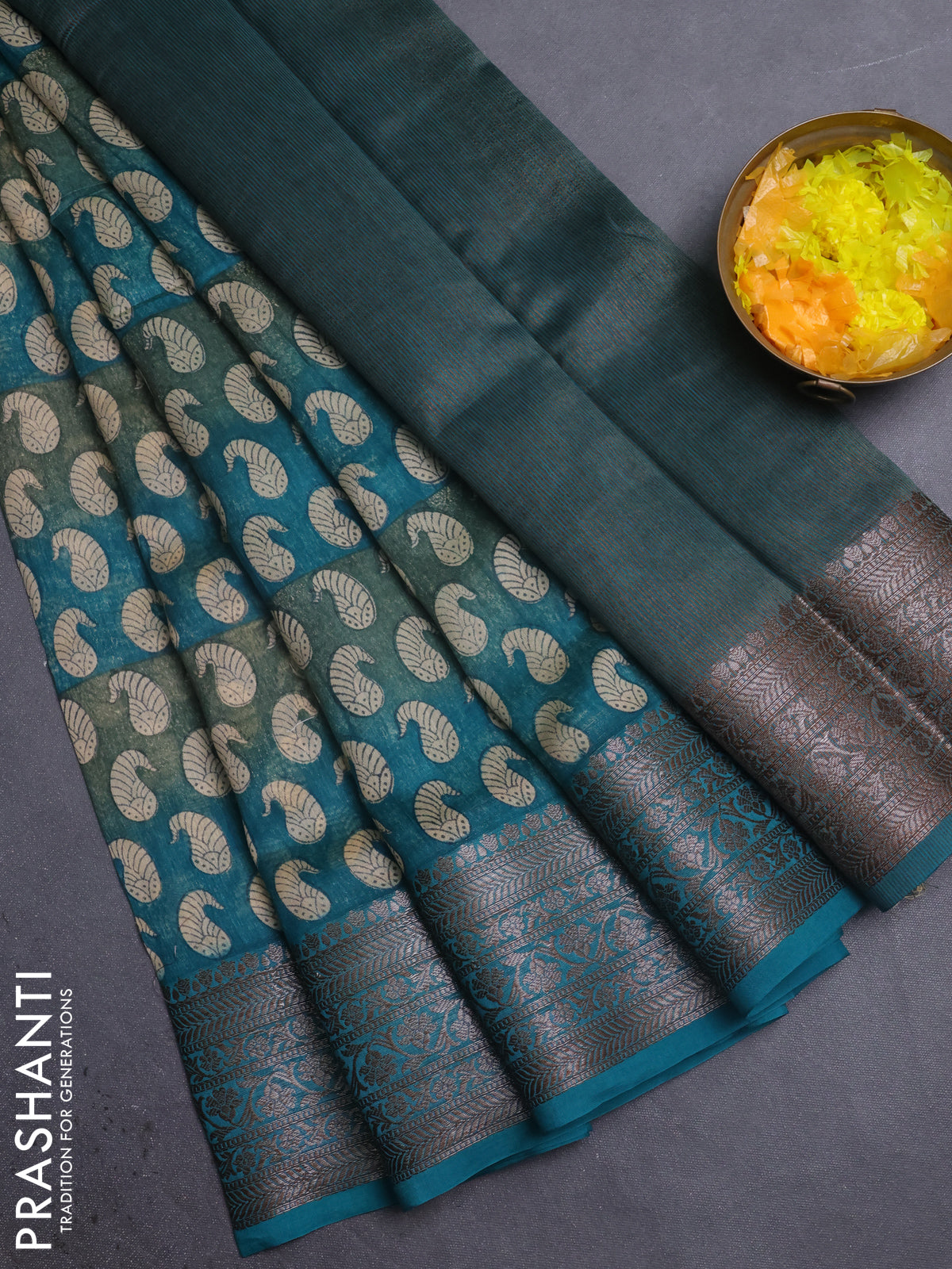Chanderi silk cotton saree teal green with allover paisley prints and banarasi style border