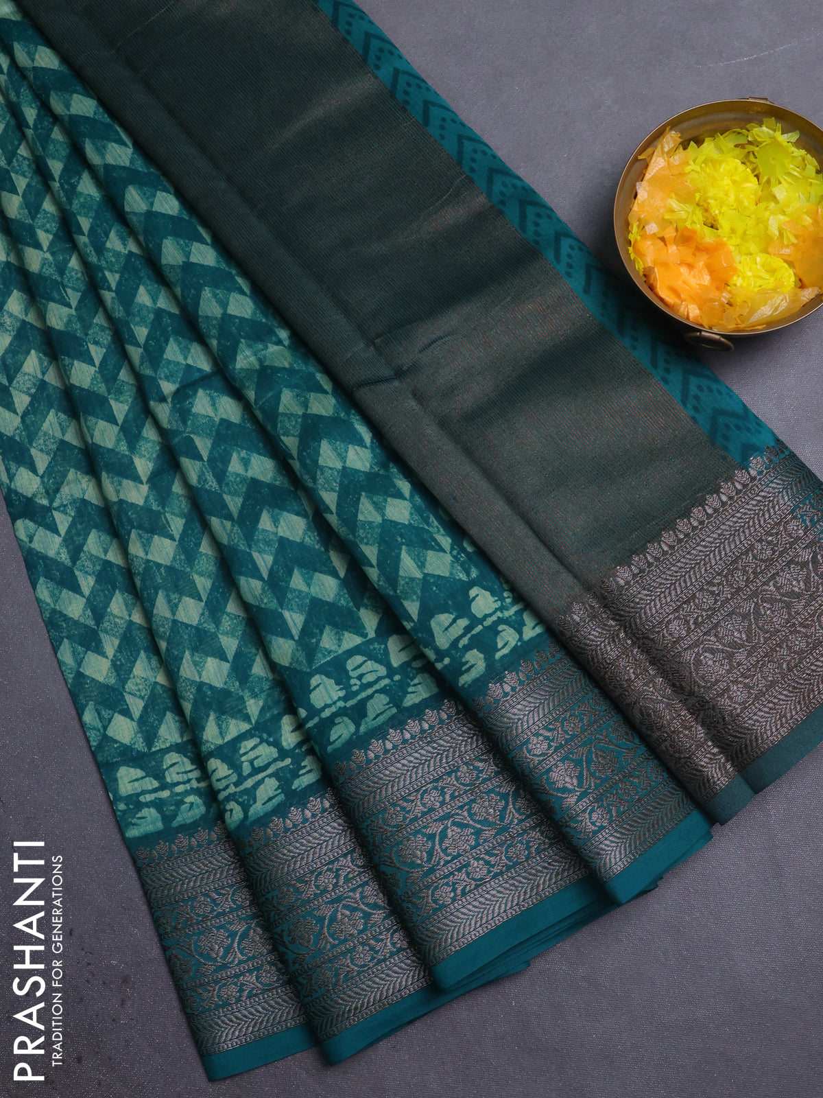 Chanderi silk cotton saree teal green with allover geometric prints and banarasi style border