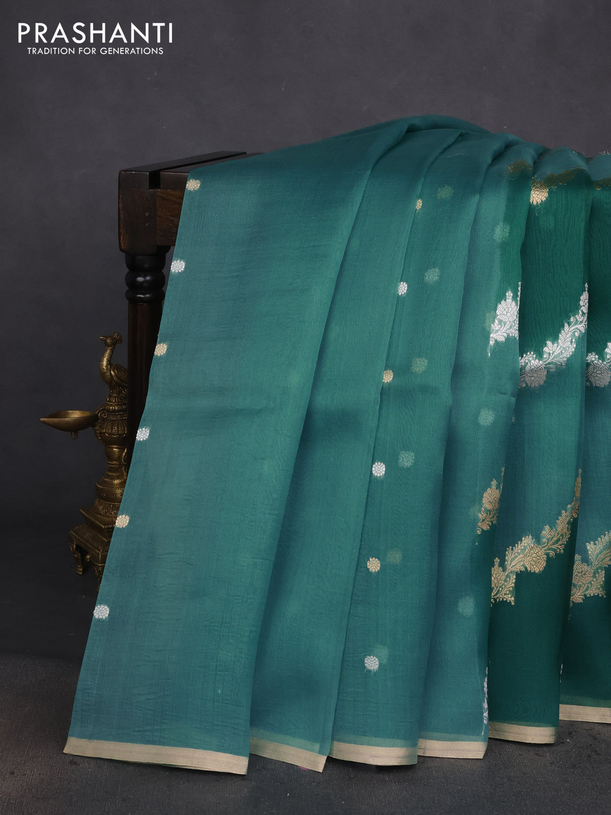 Banarasi organza silk saree teal green shade with silver & gold zari weaves and zari woven piping boder